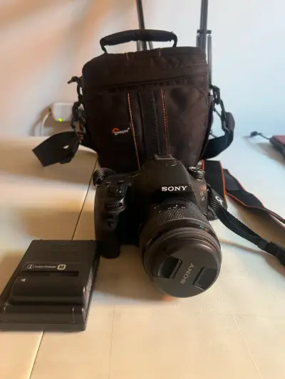 Cámara Sony con accesorios - miniatura 1