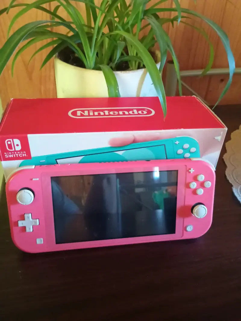 Consola Nintendo Switch Lite Coral - 1