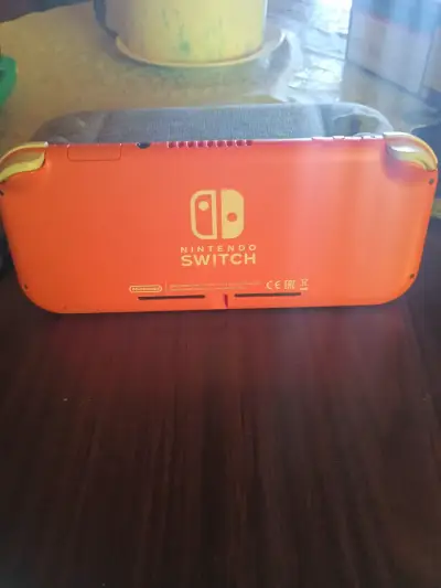 Consola Nintendo Switch Lite Coral - miniatura 6