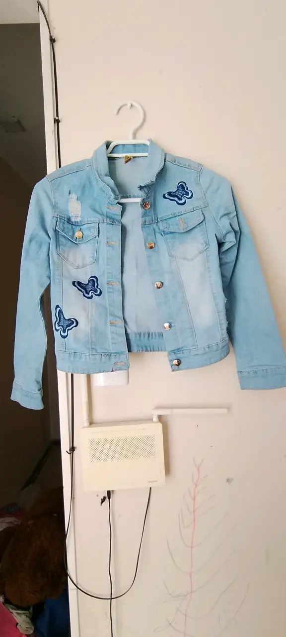 Chaqueta denim azul con parches