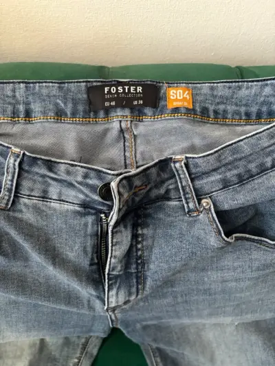 Jeans de hombre azul desgastado - miniatura 2