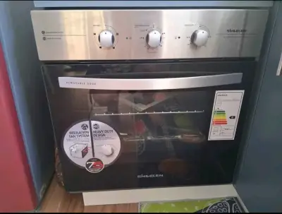 Horno eléctrico empotrable y campana - miniatura 1