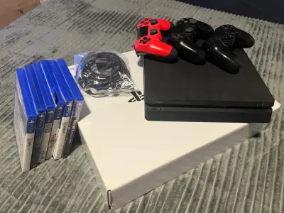 PS4 Slim 1 Tb - miniatura 1