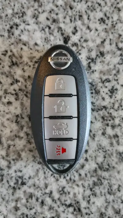 Llave auto Nissan Sentra - miniatura 1