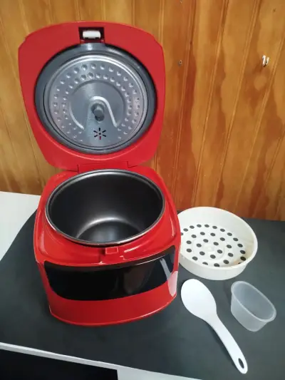 Vendo arrocera electrica 2L (NUEVA) - miniatura 1