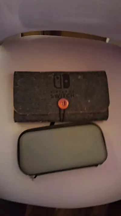 Nintendo switch lite con 4 juegos y 2 fundas - miniatura 3