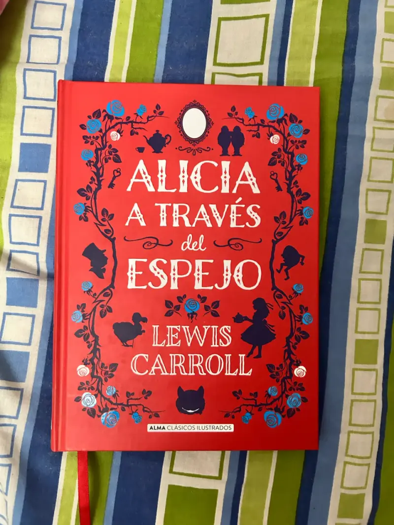 Libro original Alicia a través del espejo