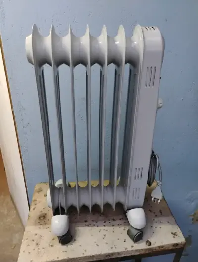 Calefactor Oleoeléctrico Ursus Trotter - miniatura 2
