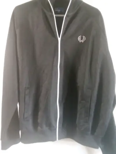 Chaqueta negra con cierre blanco - miniatura 1