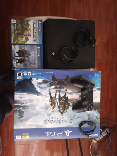 Consola PS4 con juegos y accesorios - miniatura 1