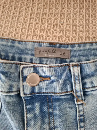 Jeans acampanados celestes talla 36 - miniatura 3