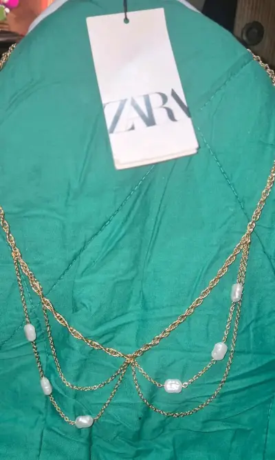 Collar dorado con perlas - miniatura 2