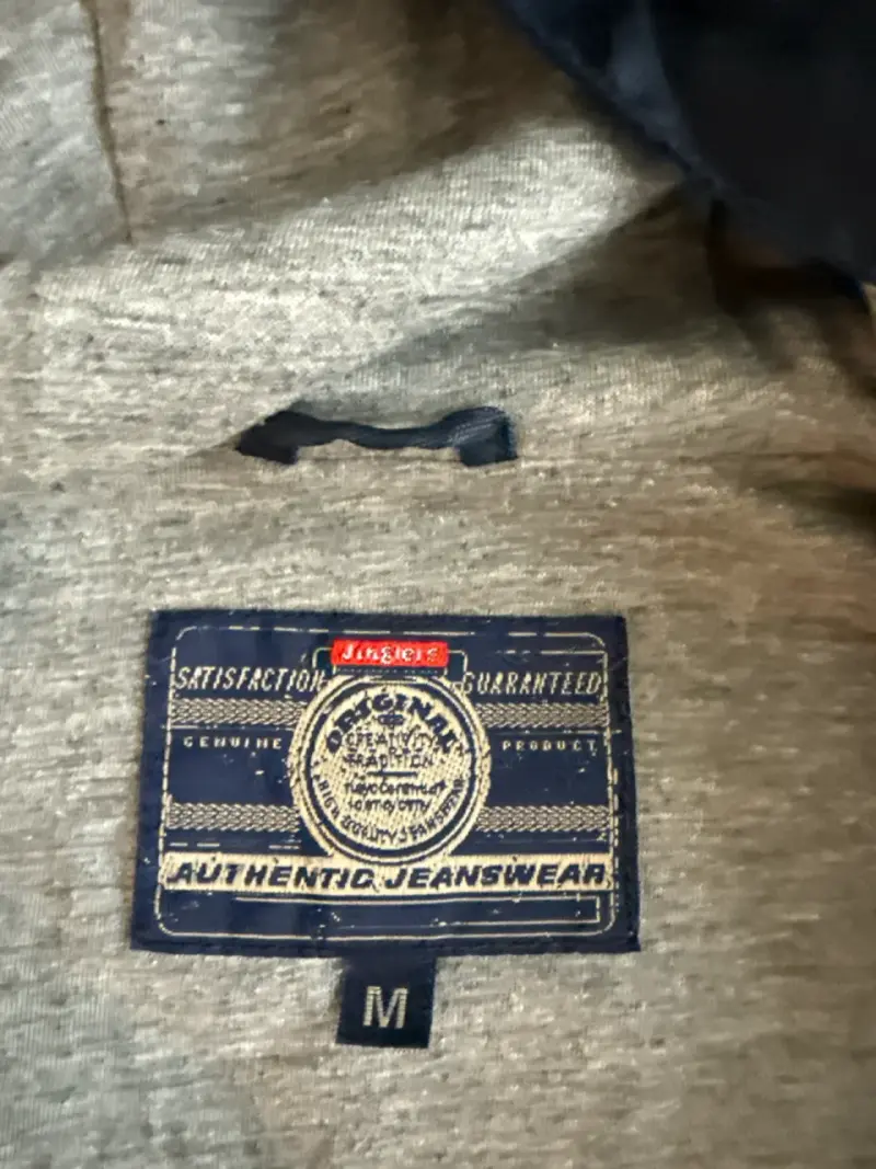 Chaqueta impermeable azul con capucha - 2