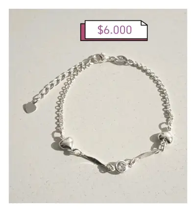 Pulsera de plata con dijes - miniatura 1