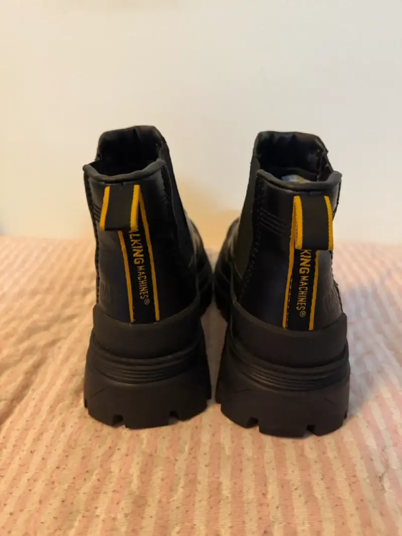 Botines negros CAT - 2