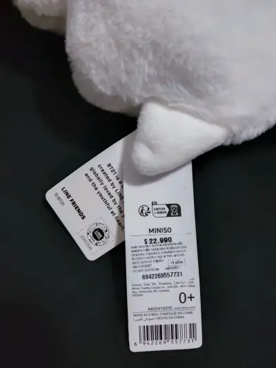Peluche blanco con bufanda naranja - miniatura 2