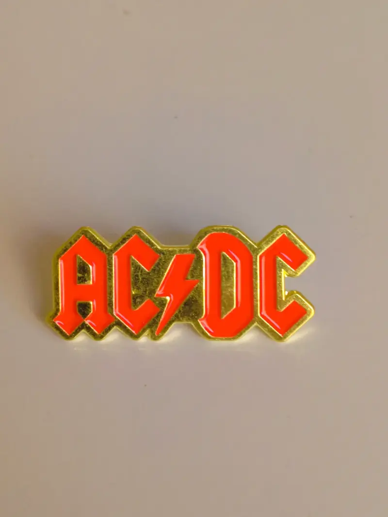 Pin metálico AC/DC - 1