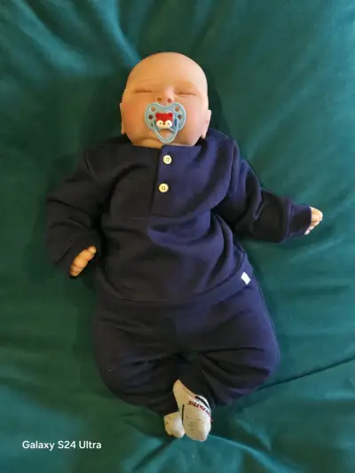Muñeco reborn realista con chupete azul - miniatura 1