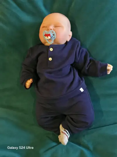 Muñeco reborn realista con chupete azul - miniatura 2