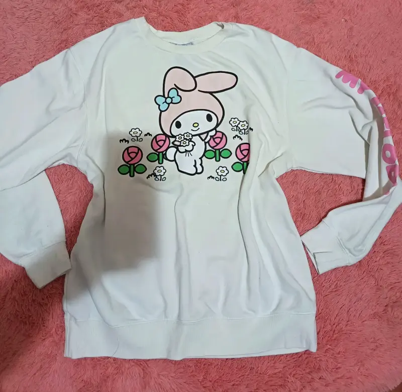 Polerón blanco con dibujo infantil