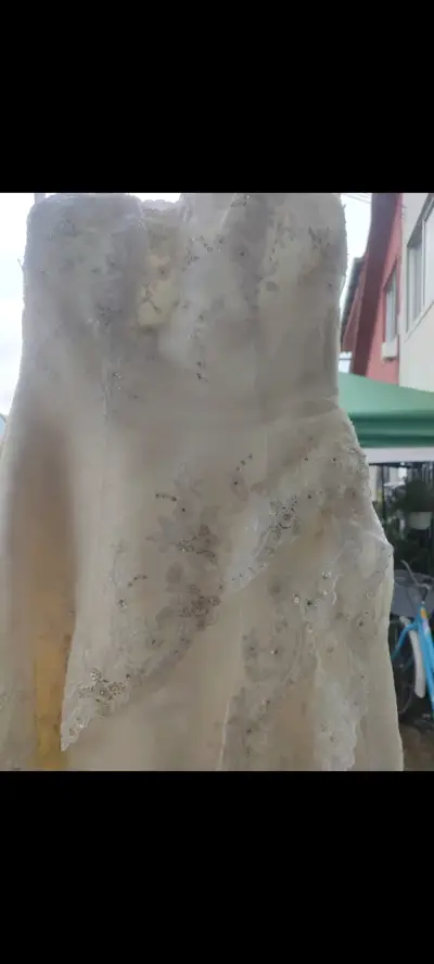 Vestido de novia blanco elegante - miniatura 1