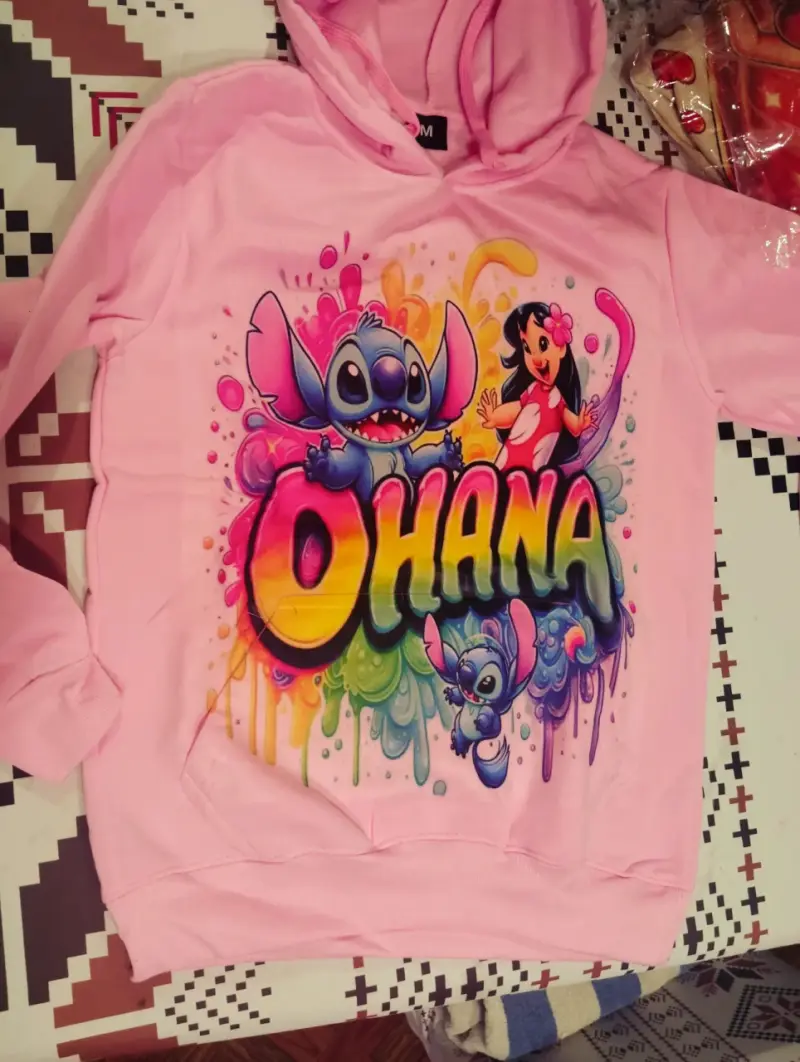 Pijama rosado peludo con diseño - 6