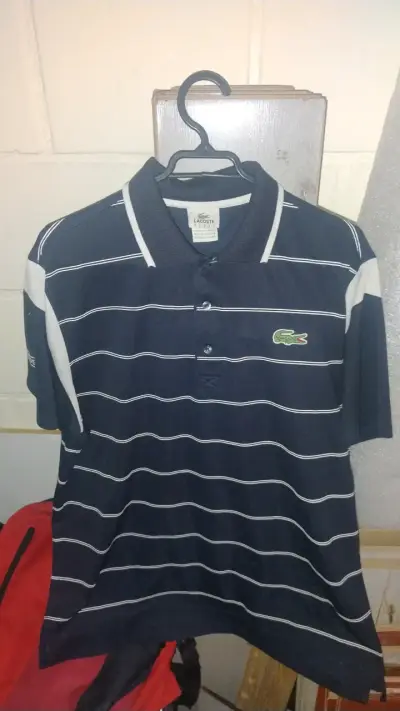 Polo Lacoste rayado azul - miniatura 1