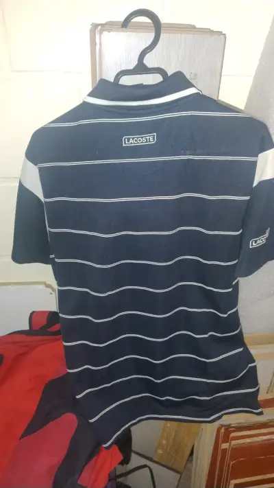 Polo Lacoste rayado azul - miniatura 4