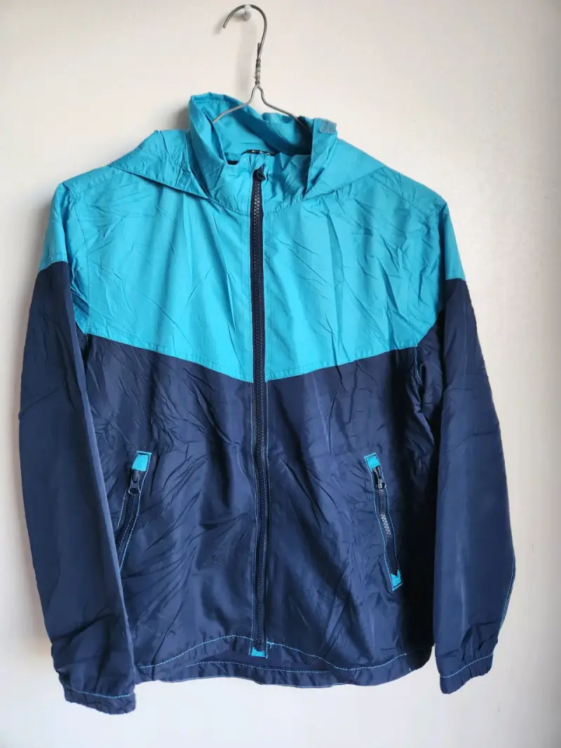 Chaqueta cortaviento azul talla L/G niños
