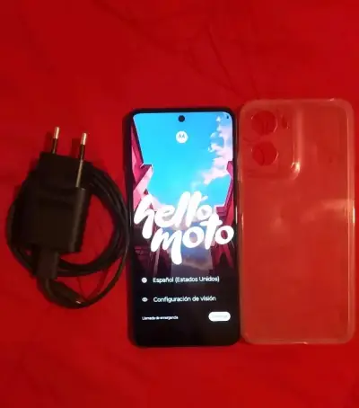 Smartphone Motorola con cargador - miniatura 1