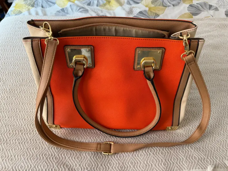 Bolso de mano naranja y beige ALDO. - 1