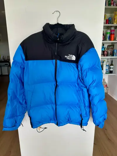 Chaqueta The North Face azul y negra - miniatura 1