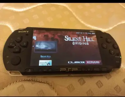 Consola Sony PSP con lector y juegos incluidos - miniatura 1