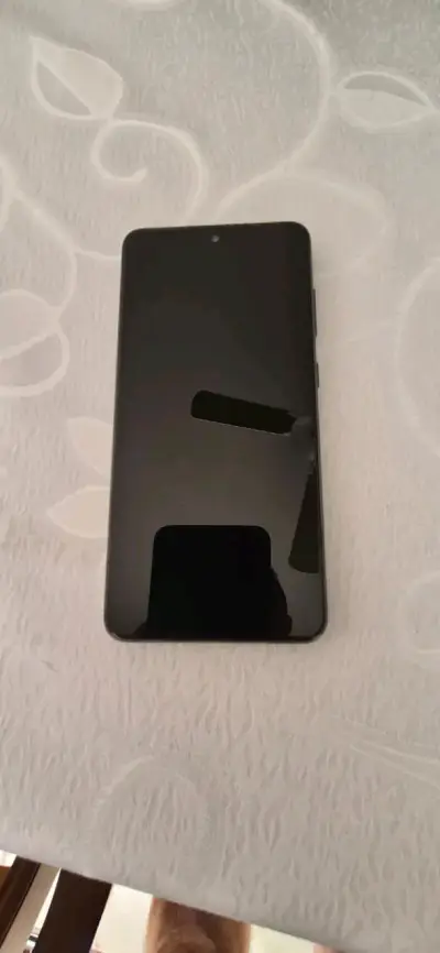 Smartphone negro en buen estado - miniatura 1