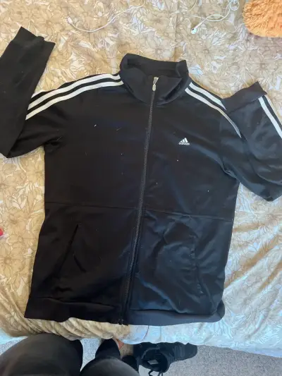 Chaqueta deportiva negra con logo - miniatura 1