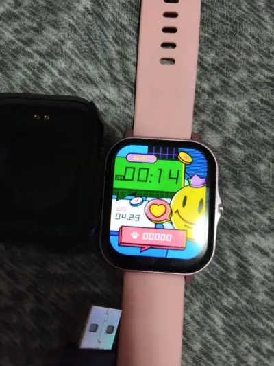 Smartwatch rosa con cargador - miniatura 1