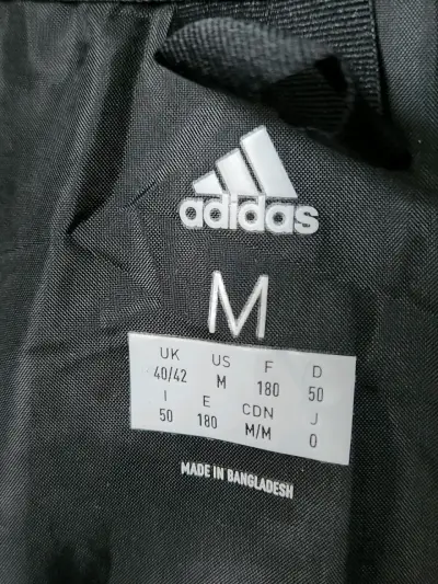 Chaqueta azul impermeable - miniatura 4