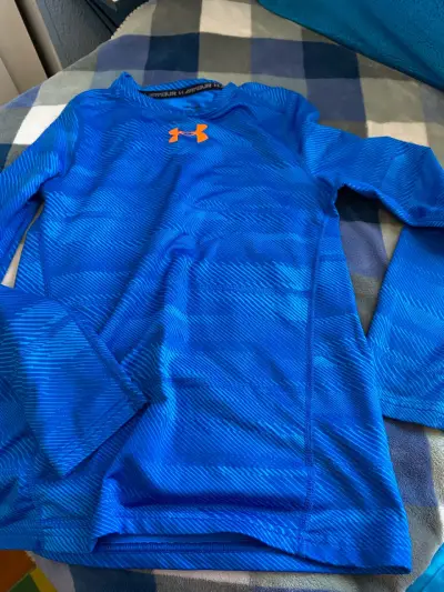 Polera deportiva primera capa azul Under Armour - miniatura 1