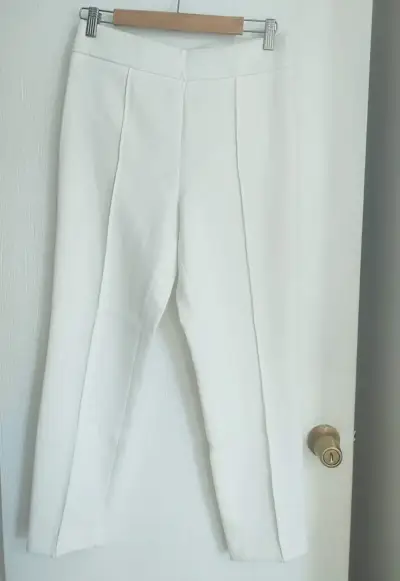 Pantalones blancos elegantes - miniatura 1