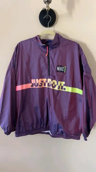 Cortaviento Nike morado - miniatura 1