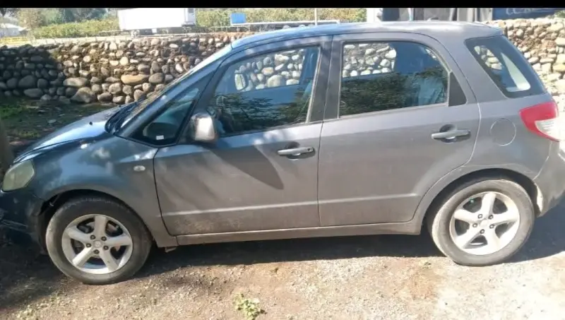 Auto Suzuki sx4 gris - 2