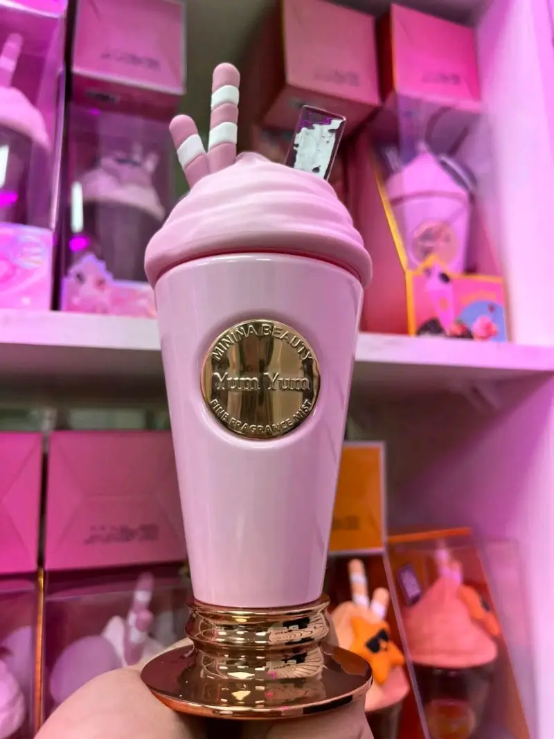 Perfume con envase rosado
