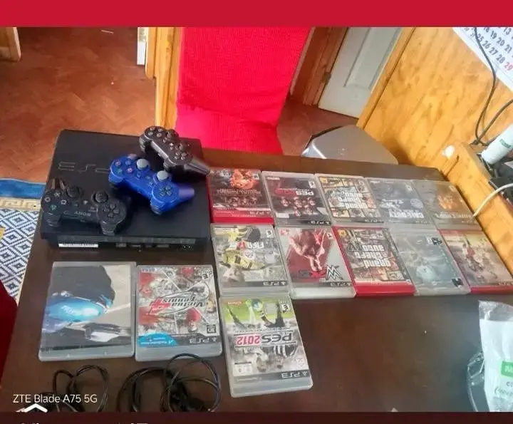 Consola PS3 con juegos y controles