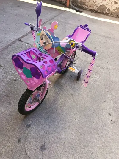 Bicicleta infantil rosada y violeta - miniatura 1