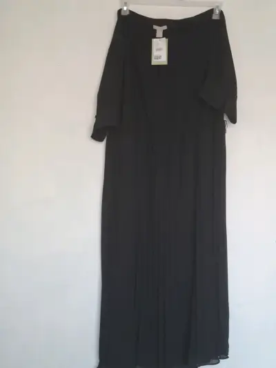 Vestido negro elegante con etiqueta - miniatura 3