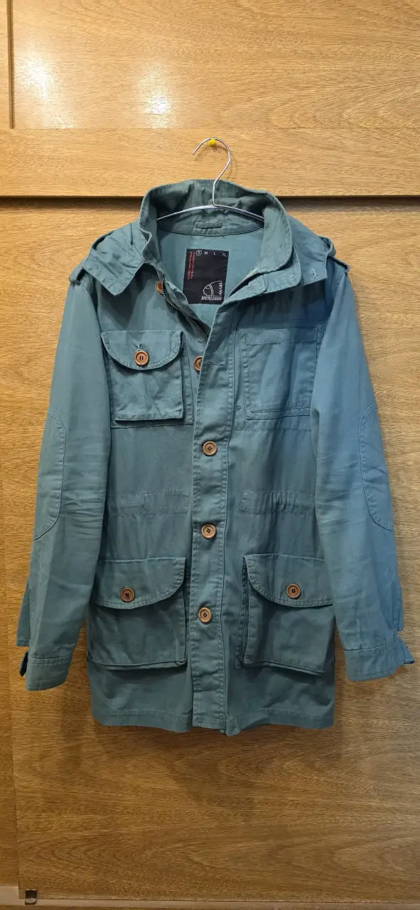 Parka verde con capucha - 1