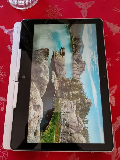 Hp revolve 810 - miniatura 1