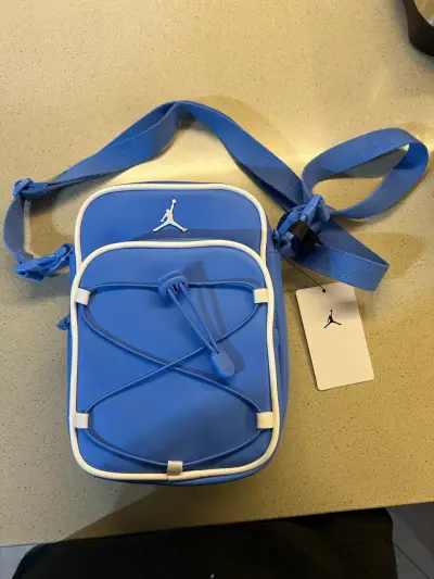 Bandolera Jordan azul y blanca - miniatura 1