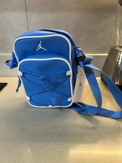 Bandolera Jordan azul y blanca - miniatura 2