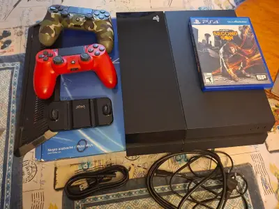 Consola PS4 con accesorios y 2 juegos - miniatura 2